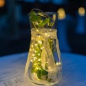 Sklenená váza so svetielkami